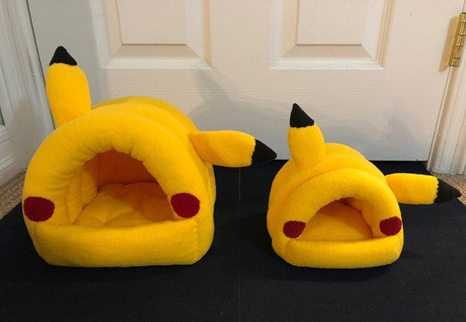 A Yellow Cow hideout canbe purchase at Adorable Pet Supply.